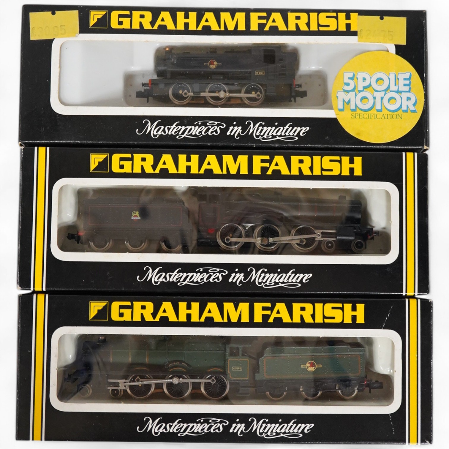 Three boxed Graham Farish N gauge BR locomotives; a Hall Class, Baggrave Hall 6994 (140A), a Hall Class 7315 (1405), and a Class 94xx pannier tank 9401 (1105). Condition - good.